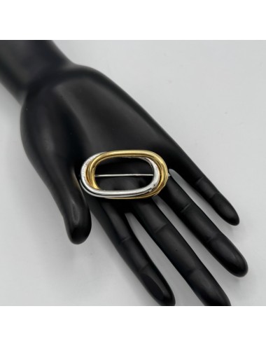 Spilla in oro bianco e giallo