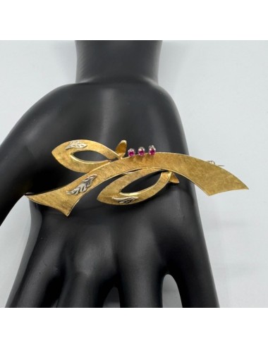 Spilla in oro giallo e Rubini