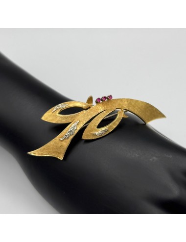 Spilla in oro giallo e Rubini