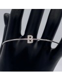 Bracciale rigido in oro bianco con iniziale in Brillanti